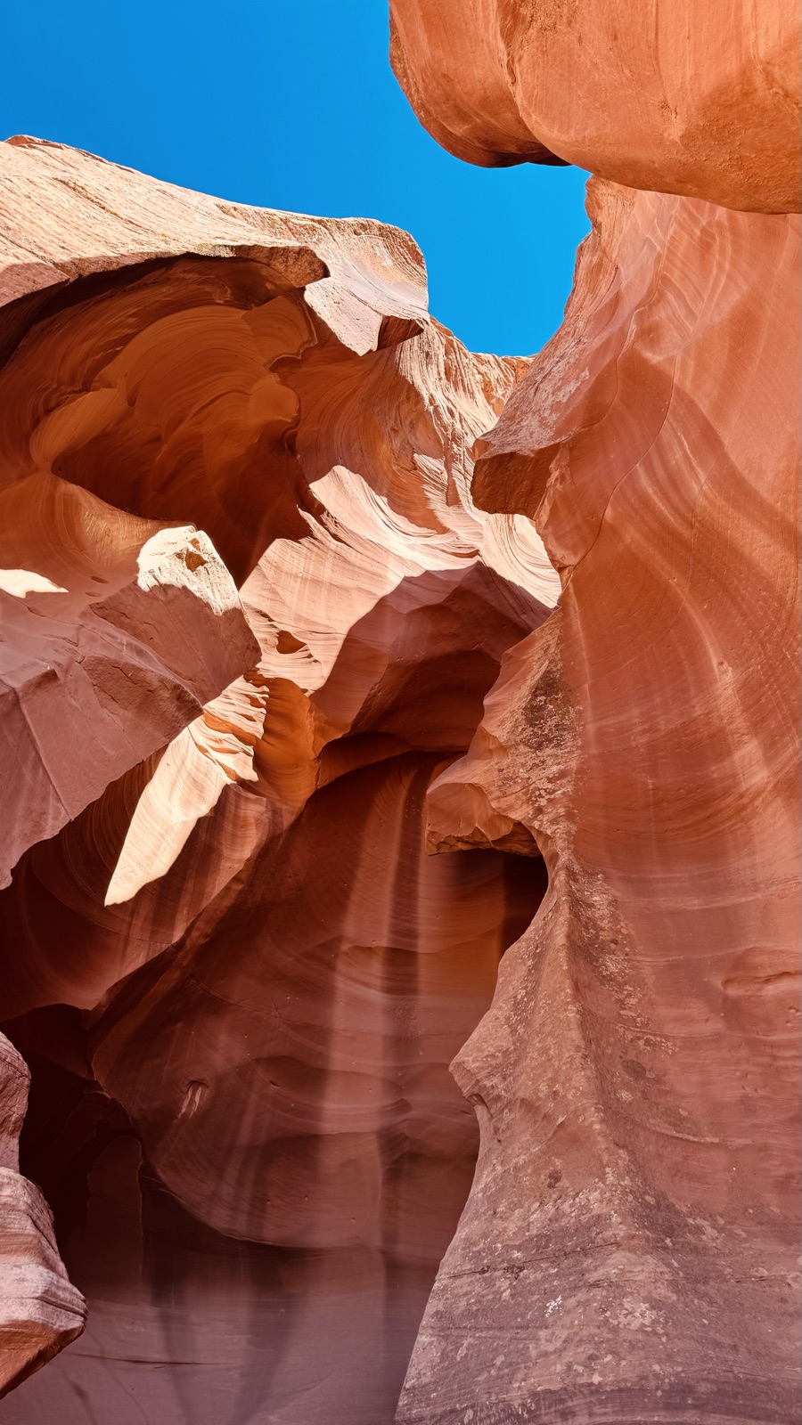 Sunlight falling through a narrow slot canyon